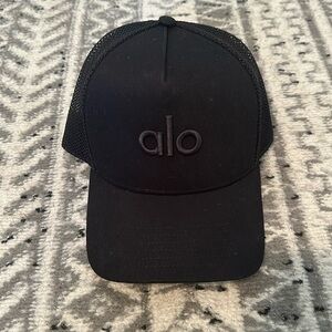 Black Alo district trucker hat